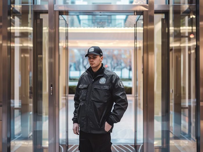 Security guard at entrance checkpoint